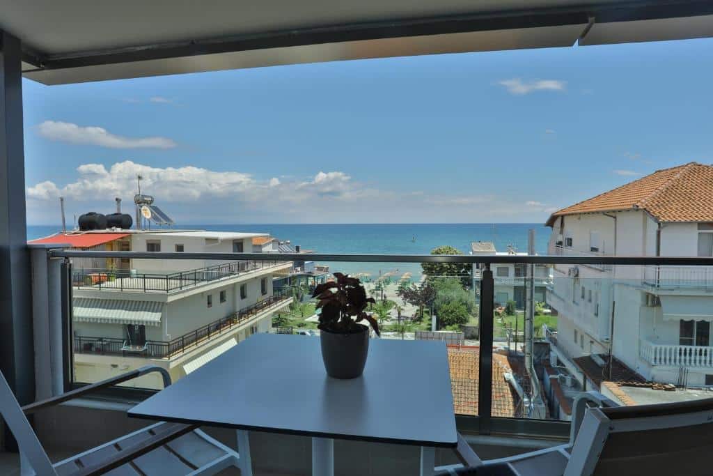 Room with one double bed, a tv and a chair