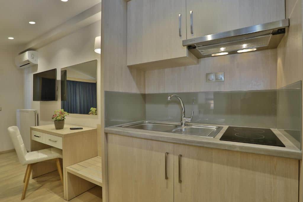 Balcony with a table, chairs and sea view