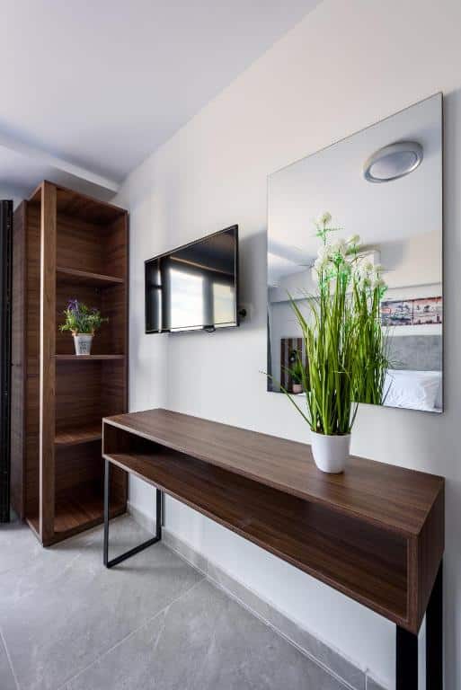 Bath tub and deck chair in front of the sea
